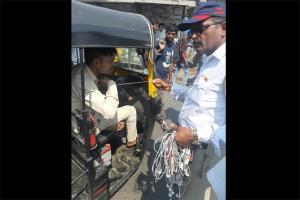 Mira-Bhayander traffic cops stop auto drivers, burn their headphones
