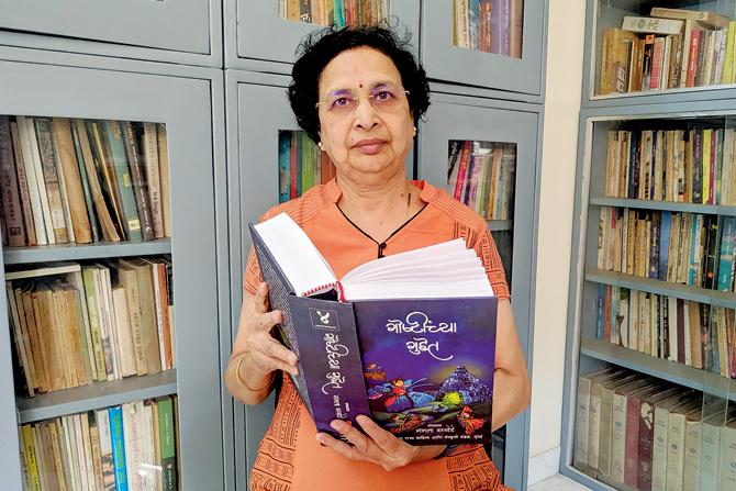 Marathi children’s literature series editor Dr Mangala Warkhede seen with one of the tomes of translated fables and animal tales that awaken readers to unknown cultures