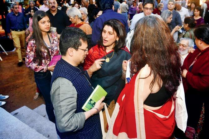 Audience members interact with author Meher Marfatia