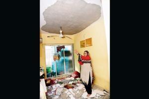 Ceiling in SRA building crashes on 4 of a family