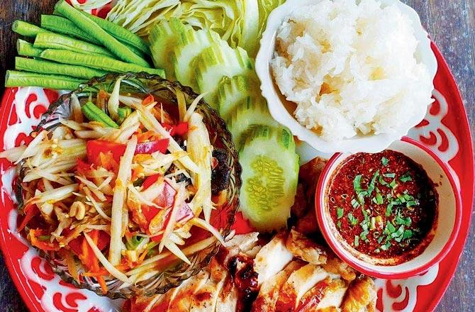 Som tam with grilled chicken and sticky rice