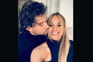 Excited NFL star Russell Wilson pampers pregnant singer wife Ciara