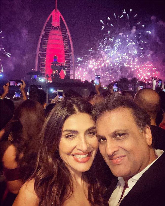 Former model and socialite Queenie Singh rang the new year in style while vacationing in Dubai. She posted this photo with her husband Rishi Sethia near the Burj Al Arab hotel amidst fireworks.
(Photo: Queenie Singh/Instagram)