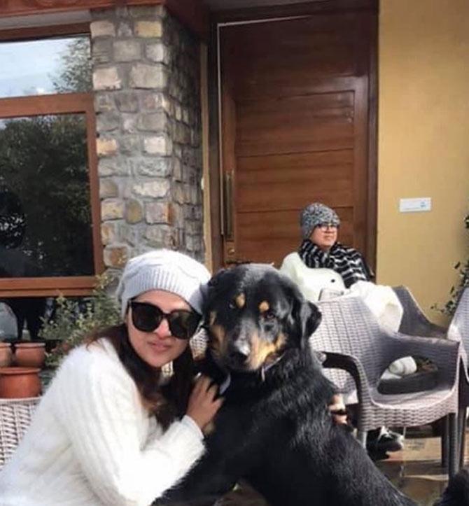 Sakshi Dhoni has proclaimed her love for her pet dogs. Here she lovingly poses with one of them