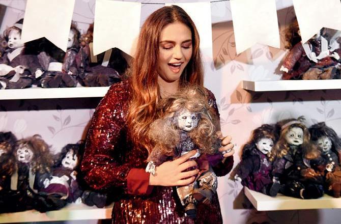 Huma Qureshi poses with a doll that is the stuff of nightmares, at a screening in Juhu. Pic/Satej Shinde