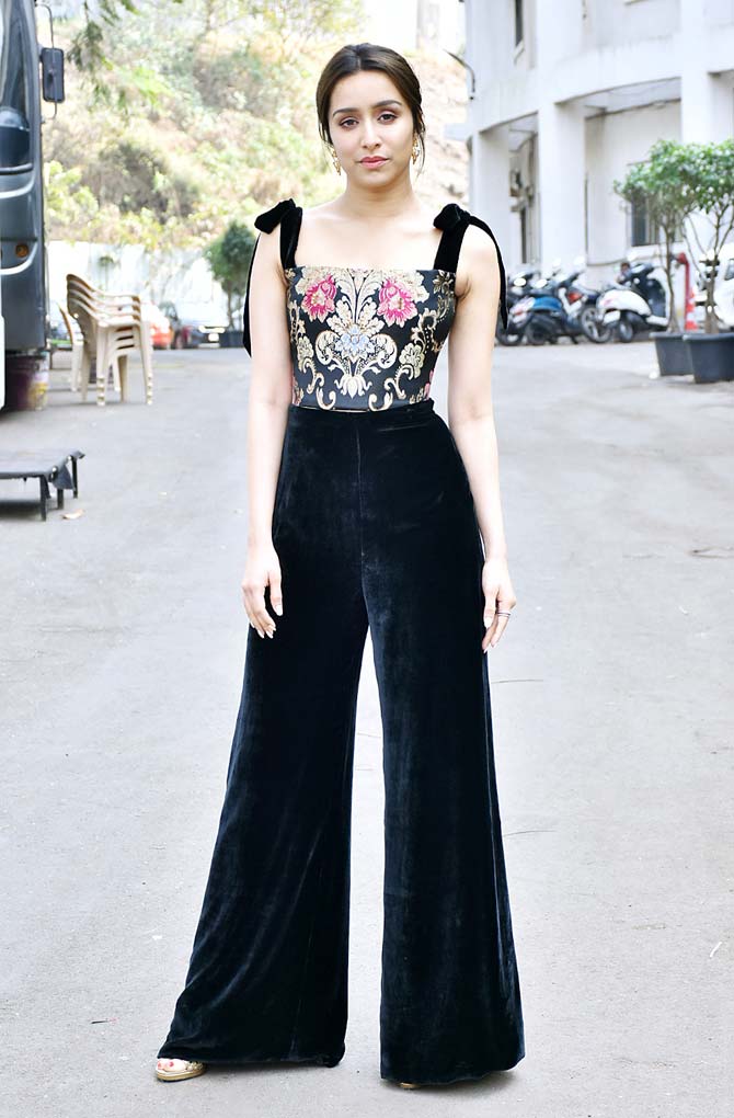 Giving him great company was Shraddha Kapoor. The actress donned a black jumpsuit with some lovely prints.