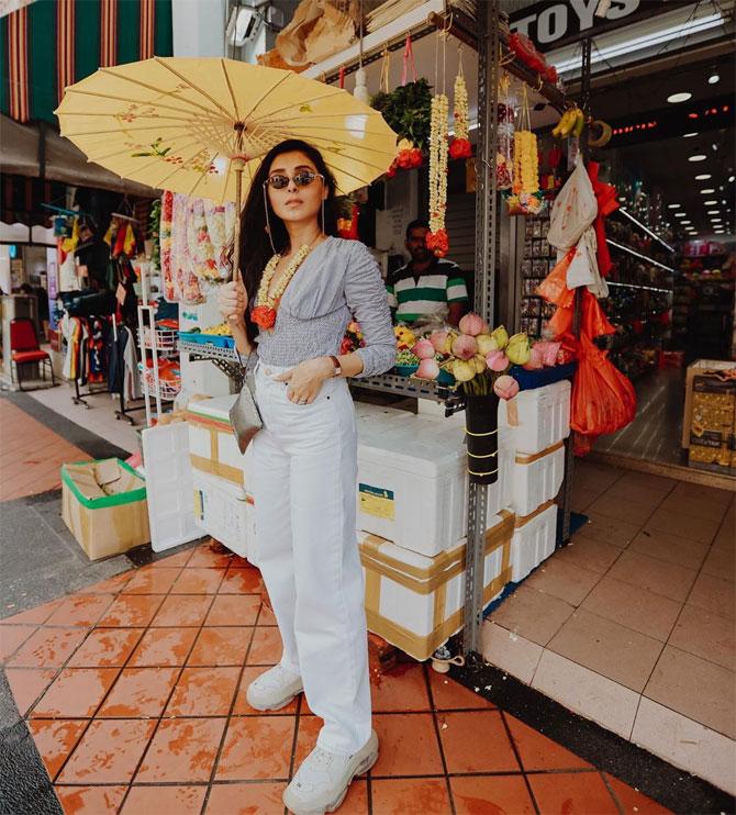In this picture taken in Little India, Singapore, she captions, 