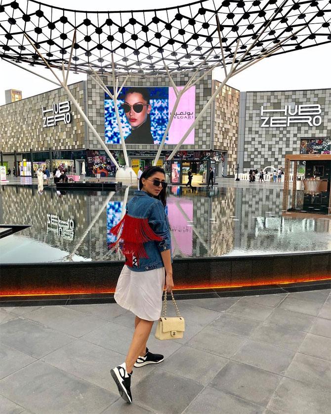 Pernia shows on her tasseled jacket during one of her trips to Dubai.