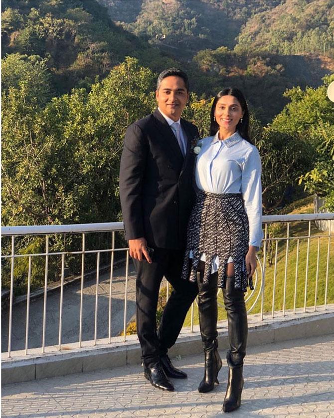 She poses with a friend amidst the hills of Dehradun. 