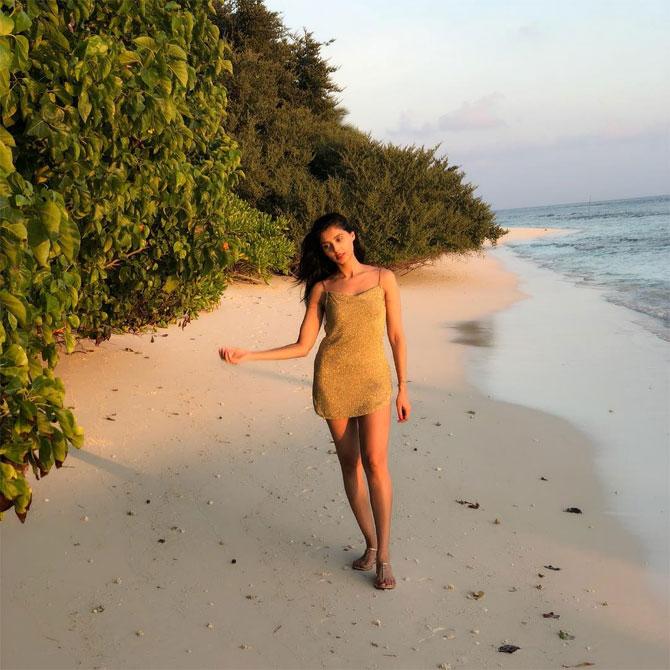 She gives summer vibe at a beach in Maldives. She captions, 