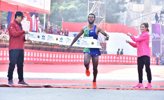 Indian speedsters Srinu Bugatha and Sudha Singh won the Indian Elite Full Marathon Men's and Women's category respectively at the 17th edition of the Mumbai Marathon. 22-year-old Derrara Hurisa from Ethiopia national won the Men's elite full marathon race. He created history as he finished the marathon in just 2:08:09