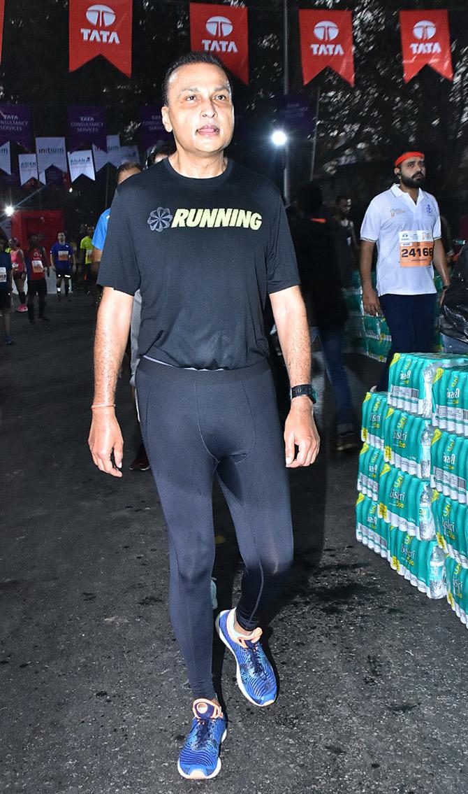 In photo: Anil Ambani sweats it out on the streets of the maximum city for the 17th edition of the Mumbai Marathon.