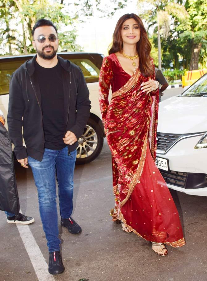 Shilpa Shetty Kundra was snapped with husband Raj Kundra at the Mumbai airport. The actress was headed to Delhi. She has been awarded the Champion of Change 2019 Award by the government of India. All pictures/Yogen Shah