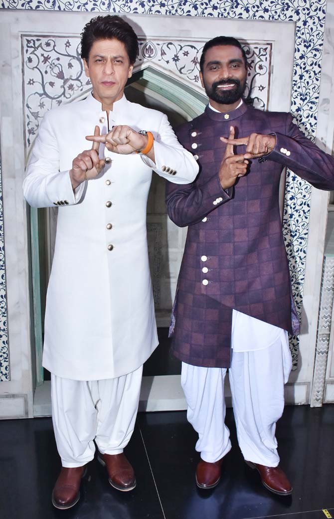 Shah Rukh Khan and Remo D'Souza posed for the paparazzi signalling the logo of the Dance+ show. It's truly heartening to see Khan arrive in full style to be a part of the show for the Republic Day special episode.