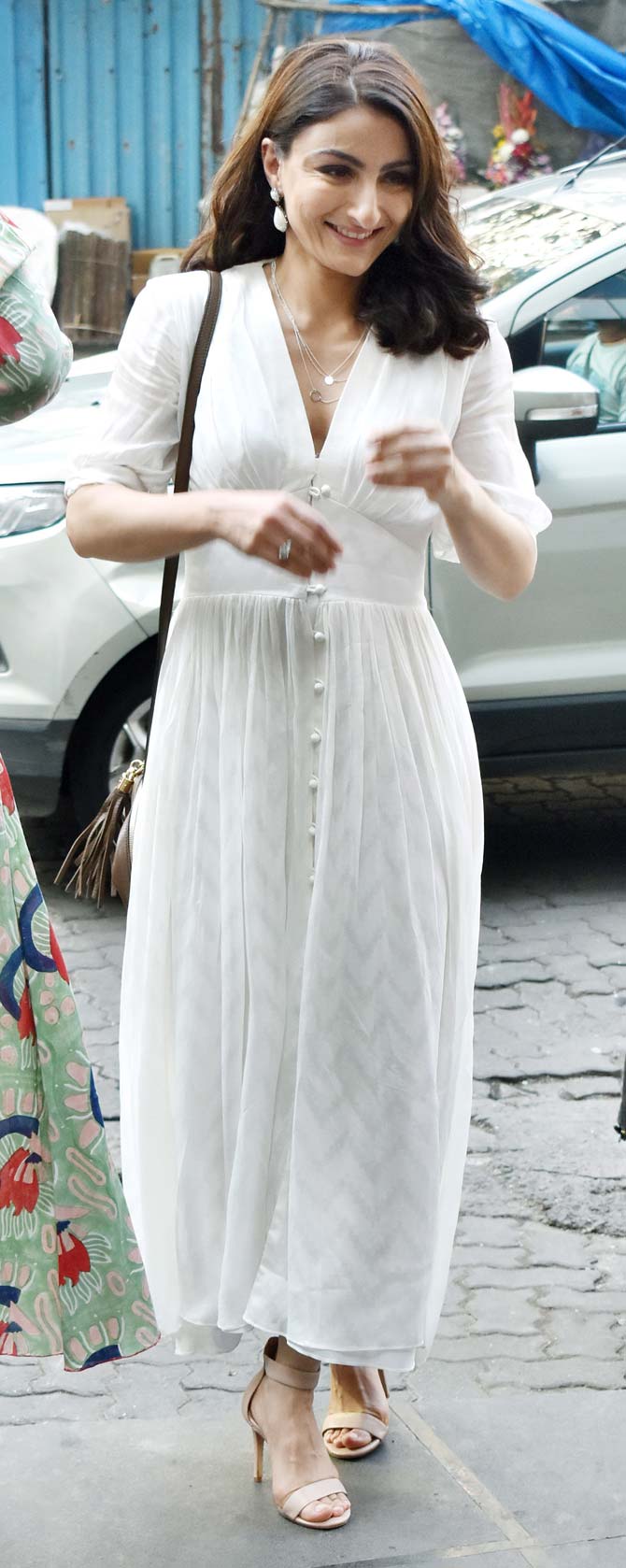 Soha Ali Khan along with other celebrities attended the launch event of leading luxury haircare brand's new range. The launch event was held at a popular restaurant in Khar. Soha looked pretty in her white dress as she arrived for the event. All pictures/Yogen Shah