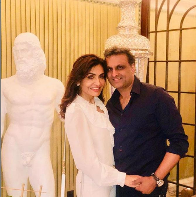 Mumbai socialite Queenie Singh was seen in an all-white suit as she struck a pose with her husband, Rishi Sethia.