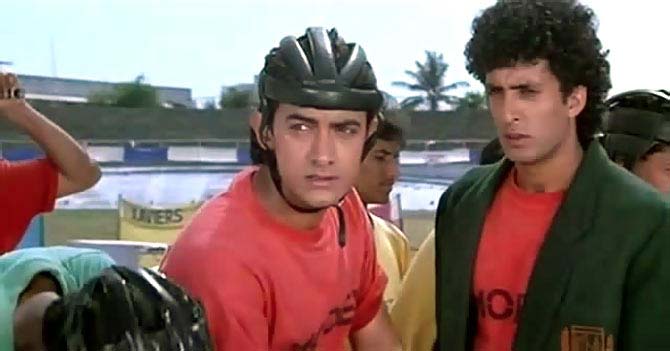 Jo Jeeta Wohi Sikandar (1992): Okay, the wait is over. Here's presenting the ultimate sports film of India - Jo Jeeta Wohi Sikandar. This sports drama, revolving around an inter-collegiate sports championship is interestingly presented with a perfect blend of family, friendship, and romance. A carefree youngster Aamir Khan has to transform himself into a responsible guy to replace his elder brother in the ultimate cycle race. Winning the race is the only option left for him. The film is best remembered for its evergreen songs, thanks to the brilliance of Jatin Lalit.