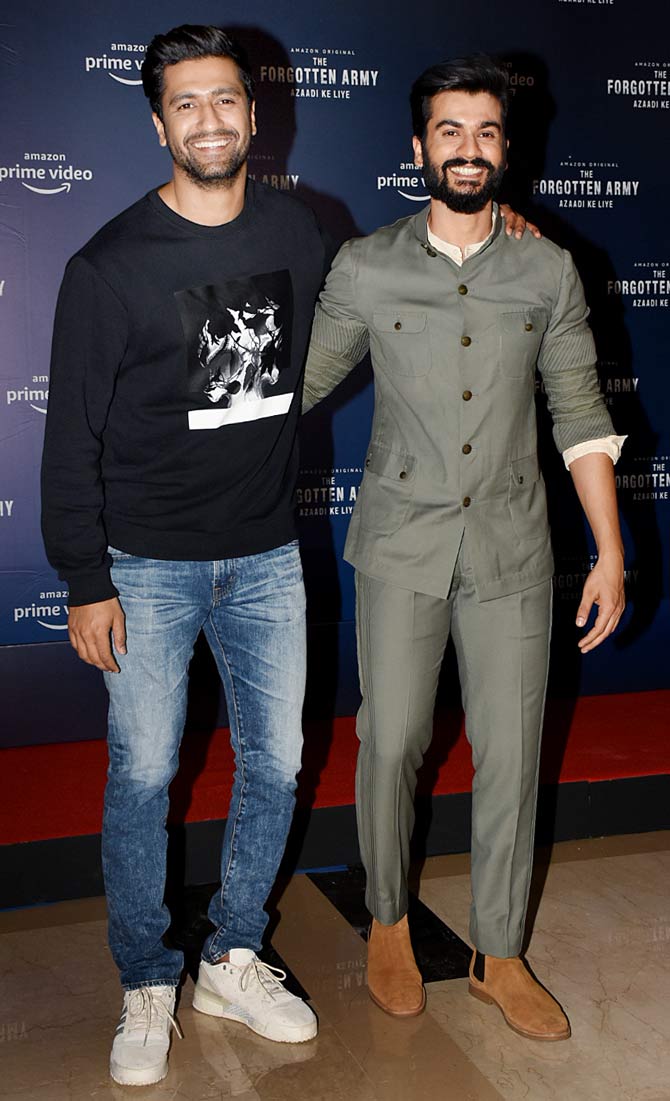 Sunny Kaushal and brother Vicky Kaushal poses for the photographers at the web series screening in Andheri.