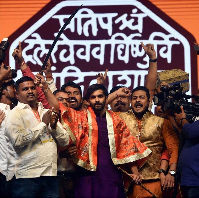Taking the saffron bandwagon and Hindutva ideology ahead, the Maharashtra Navanirman Sena (MNS) launched its new flag, which is saffron in colour with the Shivmudra in the centre, at a conclave organised by party chief Raj Thackeray on Thursday. Apart from the event being a re-launch of sorts for the party, it also turned into a launch pad for Raj's son Amit as an MNS leader.