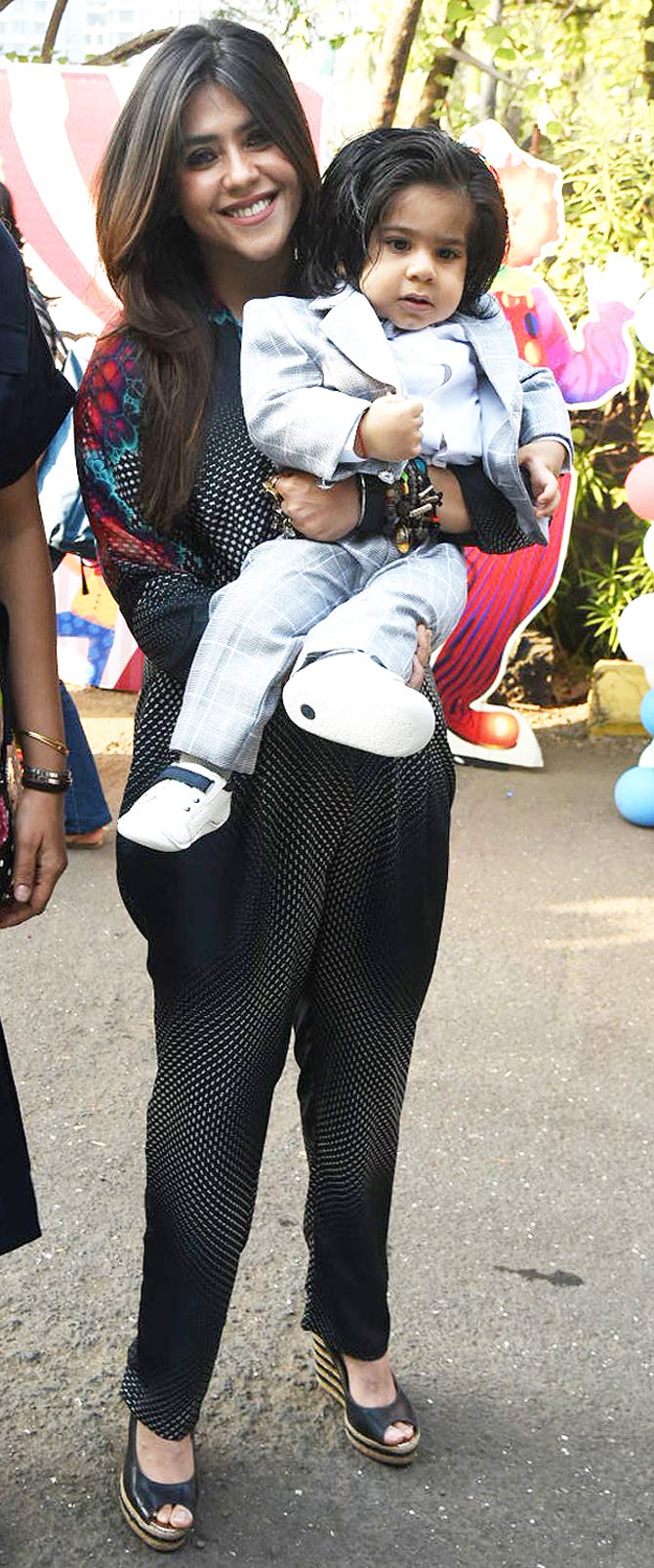 Ravie Kapoor looked extremely adorable in a grey baby pantsuit he sported for the birthday bash. While Ravie looked uber cool kid, Ekta Kapoor opted for an ombre jumpsuit during the party.