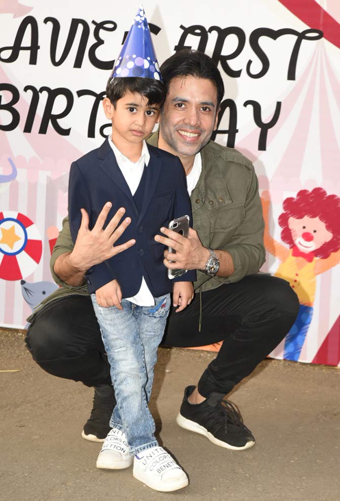 Tusshar Kapoor, who also welcomed Laksshya in his life via surrogacy posed with the son. The father-son duo were all smiles when snapped by the paparazzi at the bash.