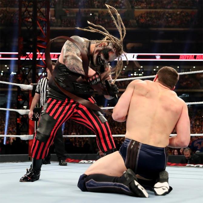 The Fiend attacked Daniel Bryan viciously throughout the match but Daniel Bryan repaid the favour. The two superstars took the match outside the ring and onto the announcer's table. 
