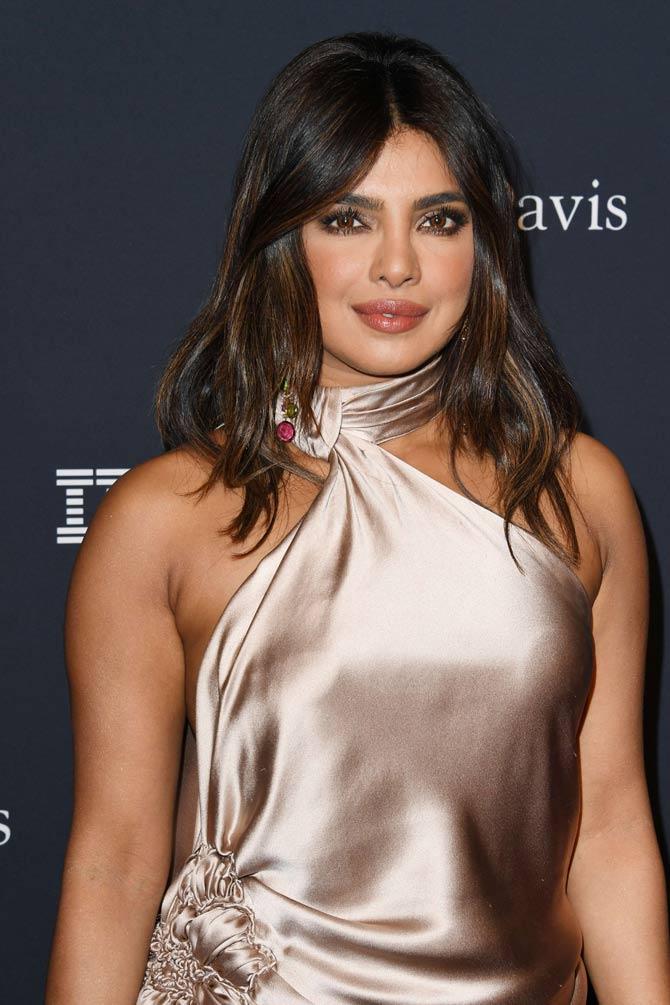 Before the dazzling star-studded night, Priyanka Chopra Jonas also shared her pre-Grammys' party look with the fans. She was seen wearing a champagne satin backless gown. The actress wrote on Instagram 