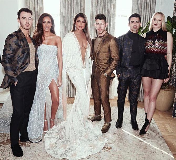 Kevin Jonas and Joe Jonas opted for outfits with prints on it, one in the shade of blue while the other had a black-cream undertone. All three Jonas Brothers Nick, Joe and Kevin nominated for their song 'Sucker' for the best pop duo/ group performance were joined by their wives PC, Sophie Turner and Danielle Jonas at Hollywood's biggest musical gala event.
