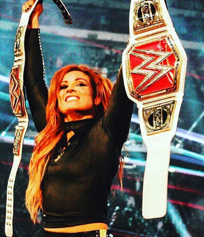 At WrestleMania 35, Becky Lynch defeated SmackDown women's champion Charlotte Flair and Raw women's champion Ronda Rousey to win both titles. The women also headlined the first-ever women's main event in WrestleMania history.
