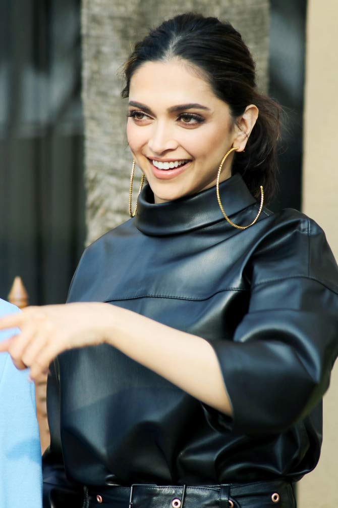 The Piku actress is has been wearing outfits in a unique style for her promotions. From a chic patterned outfit to an orange bodycon dress, and from donning a multicoloured saree to a corset shirt top, Deepika has been slaying the show.