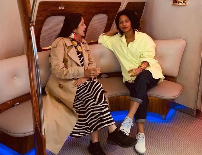 Masaba Gupta shared this picture from her travel journey with her mother Neena Gupta. In the picture, Masaba can be seen caught in a candid conversation with her mom. Holding a glass of wine in her hands, Masaba captioned this one: Just before I was given a mild lecture over drinks by mom at 35,000 ft!










