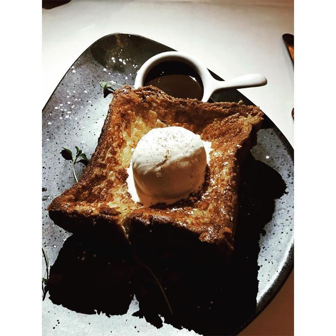 Besides delicious meals and clean and healthy food, Masaba Gupta also has a soft corner for desserts. From cheesecake tart to ice creams and much more. The 31-year-old designer shared this picture from one of her cheat days where she was seen relishing hot chocolate with ice cream. While sharing the picture, Masaba wrote: It was leg day. She ended her witty caption with a woman shrugging and white medium star emoticon.

