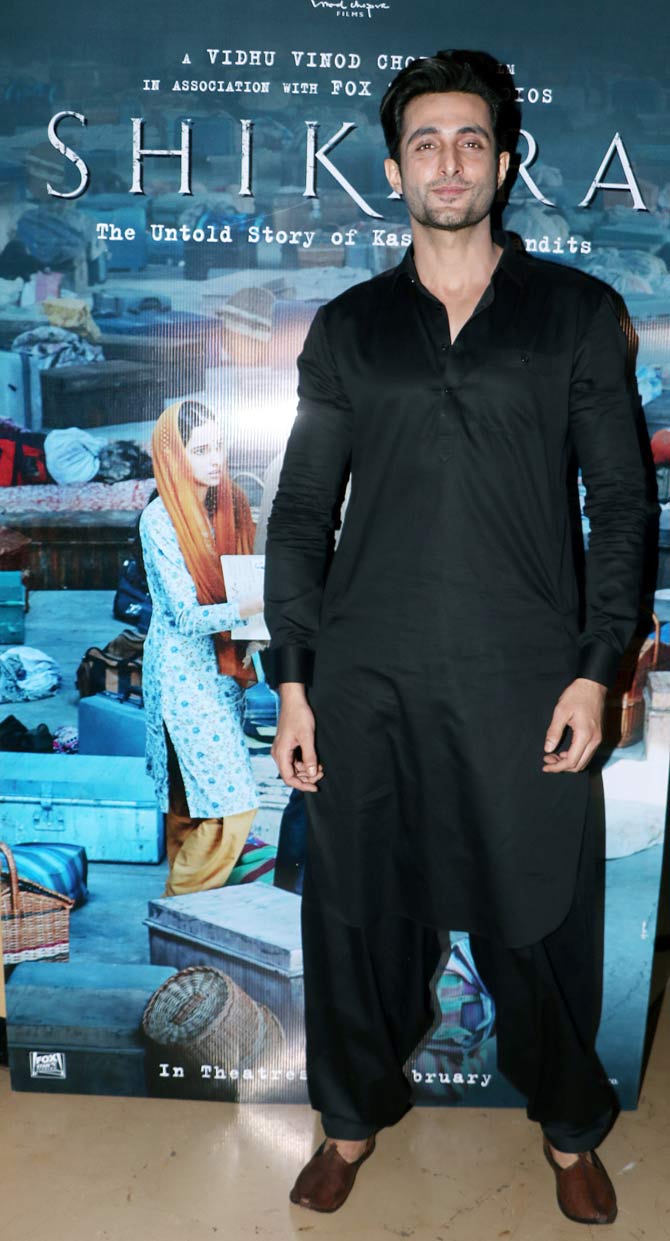 Shikara brings back the untold story of Kashmiri pandits from the valley of 1990 and has 40,000 real migrants of Jagti and other camps who shot for the film. The movie also has actual footage from the exodus included which brings it even closer to the reality.
In picture: Aadil Khan looked dapper in his black pathani as he arrived for Shikara screening in Juhu.