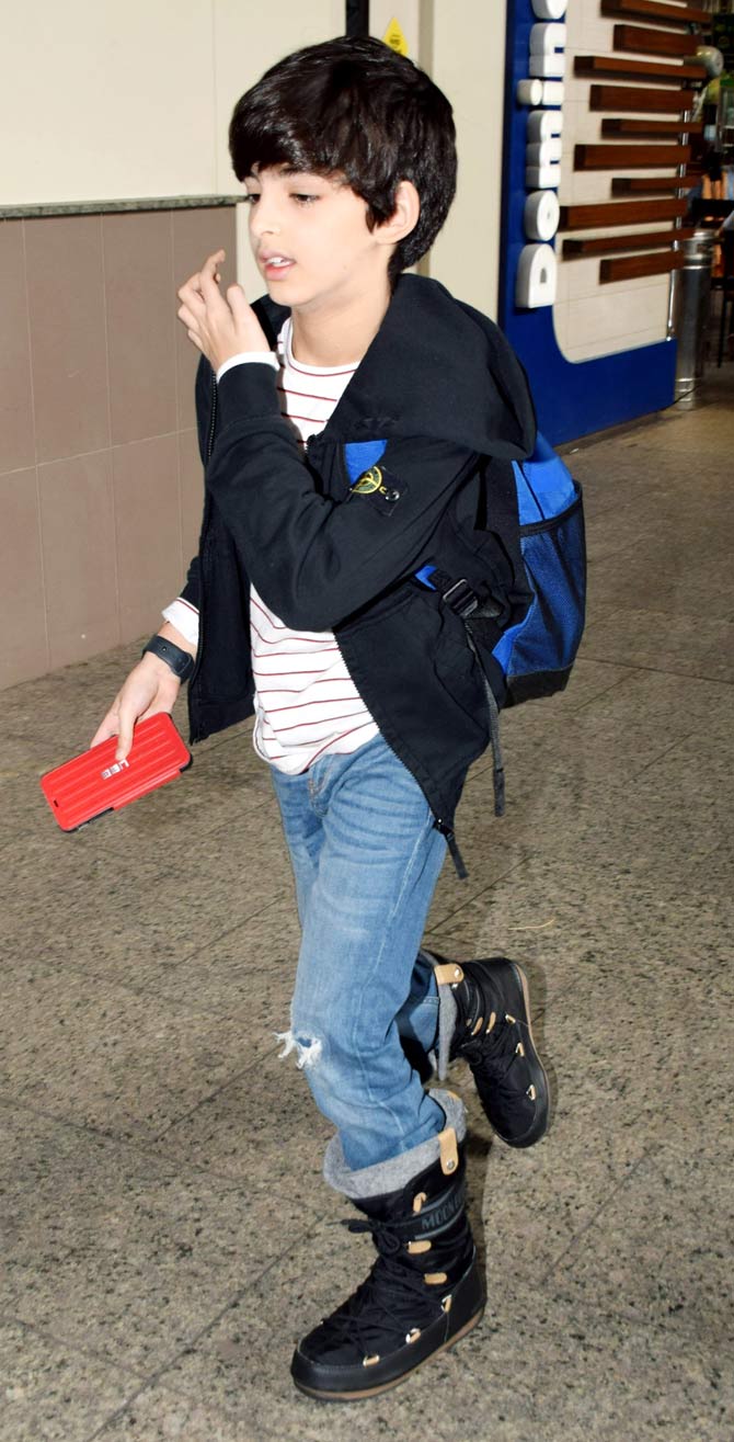 Hridhaan Roshan too looked smart in a super-comfy yet stylish outfit. The little one opted for a white striped tee, slightly ripped jeans, black hoodie, and high boots.