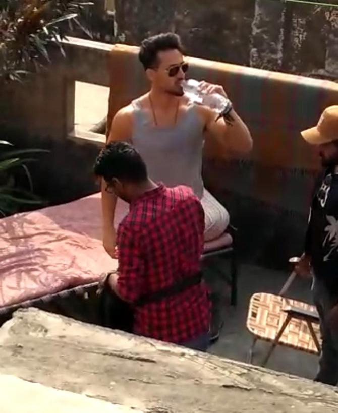 After riding high on the success of War, Tiger Shroff seems all set to treat his fans with his big biceps in his upcoming film, Baaghi 3. The actor was clicked by the paparazzi shooting for the third installment in Jaipur. All pictures/Pallav Paliwal