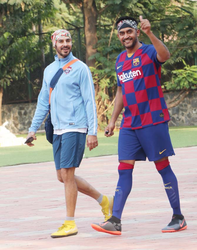 Dino Morea and director Shashank Kaitan were all smiles as they posed for the photographers at the Juhu ground.