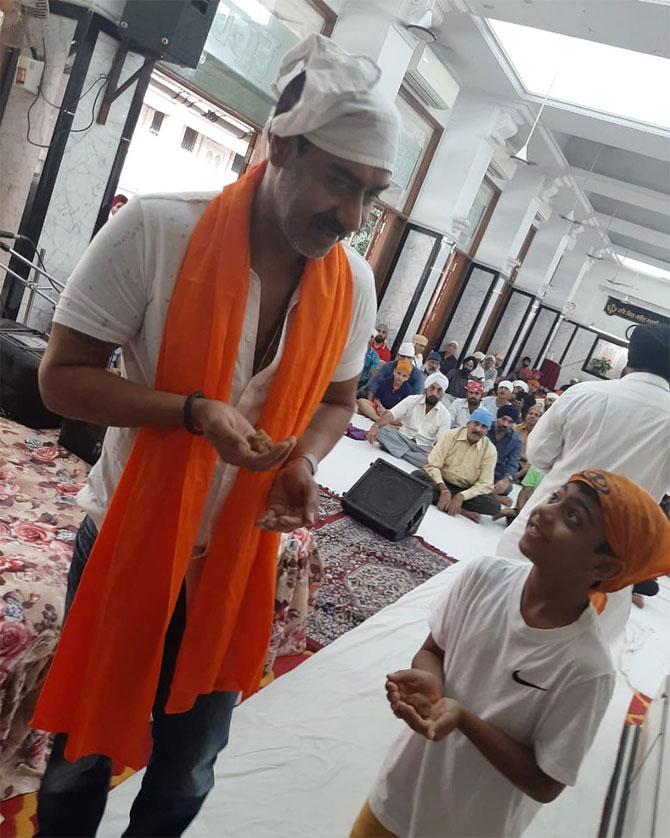 Ajay Devgn with his son Yug at a Gurudwara. Ajay shared this picture on Instagram and captioned it: It's a joy watching you grow. Can never have enough