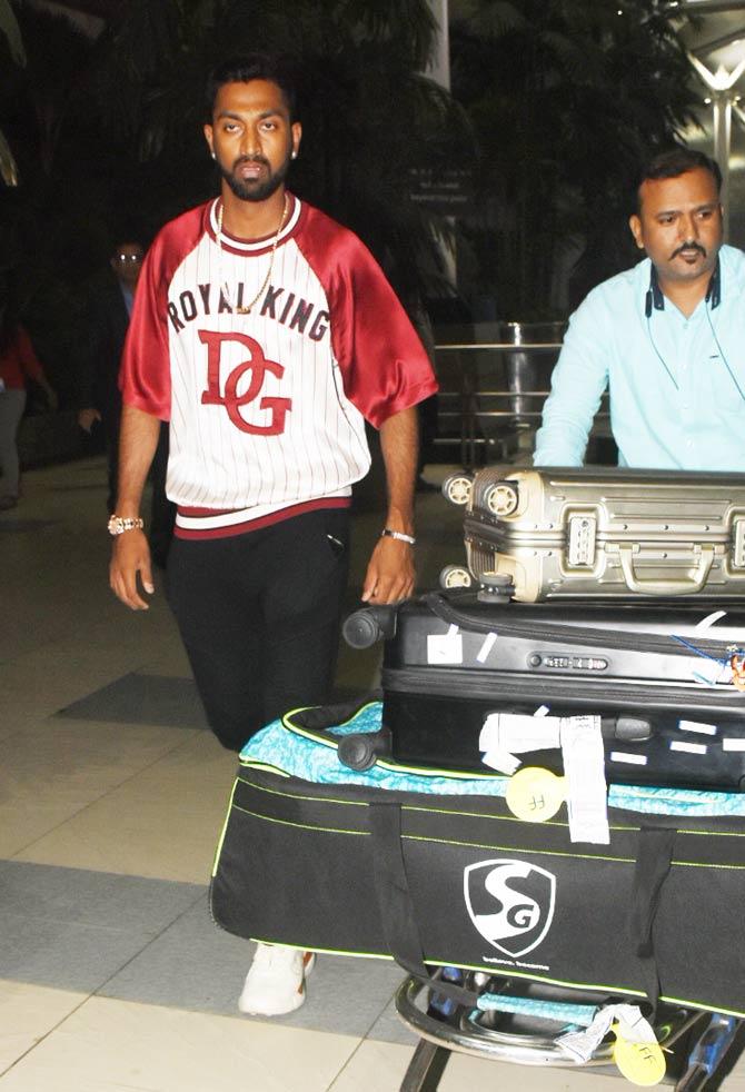 Krunal Pandya was seen sporting a white and red jersey with the words 'Royal King' printed on it. Krunal paired it with black joggers and white trainers