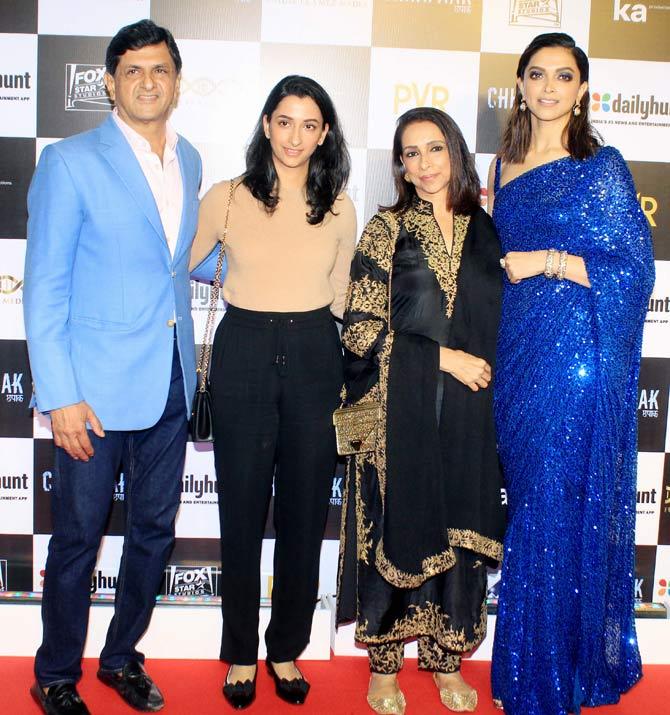 Deepika Padukone seen posing with father Prakash Padukone, mother Ujjala and sister Anisha Padukone at the special screening of her film Chhapaak at a popular multiplex in Juhu.