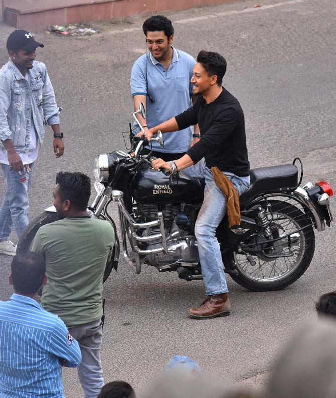 Tiger Shroff continues to heat up the audience's curiosity, thanks to the continuous flow of pictures from Baaghi 3 sets in Jaipur. Days after showcasing his acting skills (and his muscular body) in the pink city, the actor was again papped along with his Baaghi 3 co-stars Shraddha Kapoor and Ankita Lokande. All pictures/Pallav Paliwal