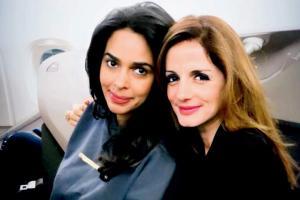 B-town buzz: Mallika Sherawat and Sussanne Khan bond on a flight