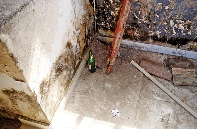 Empty liquor bottle seen at Kaifi Azmi Bhavan