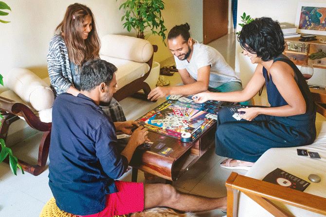 (From bottom left) Shankar Swamy, Nandini Chettur, David Corrie and  Lavanya Ullas play Monopoly Speed