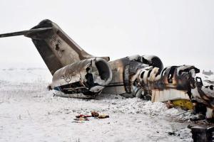 Taliban and Afghan forces clash near US jet crash site
