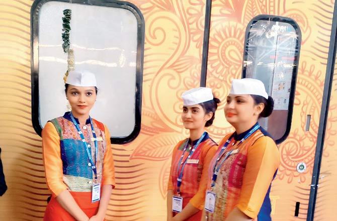 The rail hostesses were given Nehru topis on the journey to Mumbai