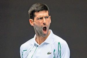 Defending champ Novak Djokovic credits new serve for unbeaten run