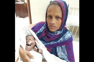 Doctors conduct open heart surgery on farmer's 10-day-old infant