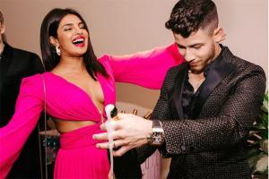 This is how much Priyanka Chopra's neon pink cutout gown costs