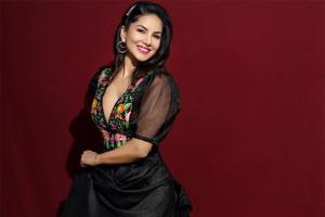 Sunny Leone's black maxi dress with plunging neckline is in fashion!