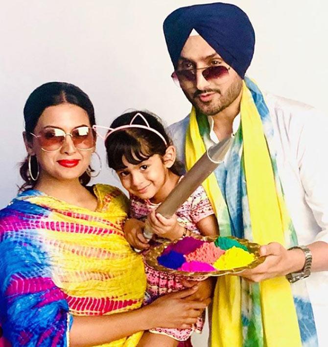 What a colourful trio! Harbhajan Singh, Geeta Basra and Heer Hinaya Plaha during Holi 2020.